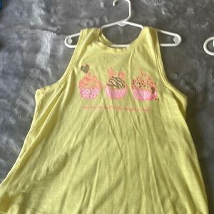 Yellow tank top with cupcakes “cupcakes are muffins that believe in magic”